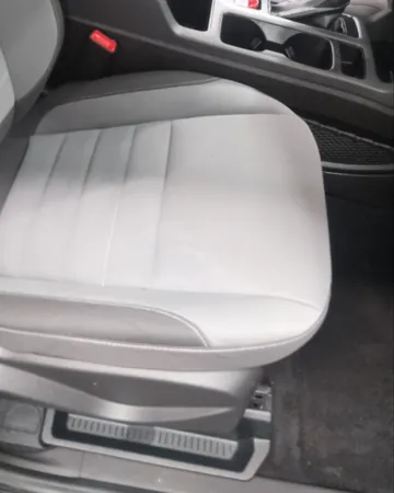 The same passenger seat after an interior detail